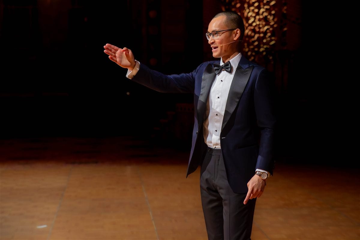 Baenedict Thiveanathan, international close-up and stage magician and co-founder of Adelaide Magic Theatre, performing for a delighted audience