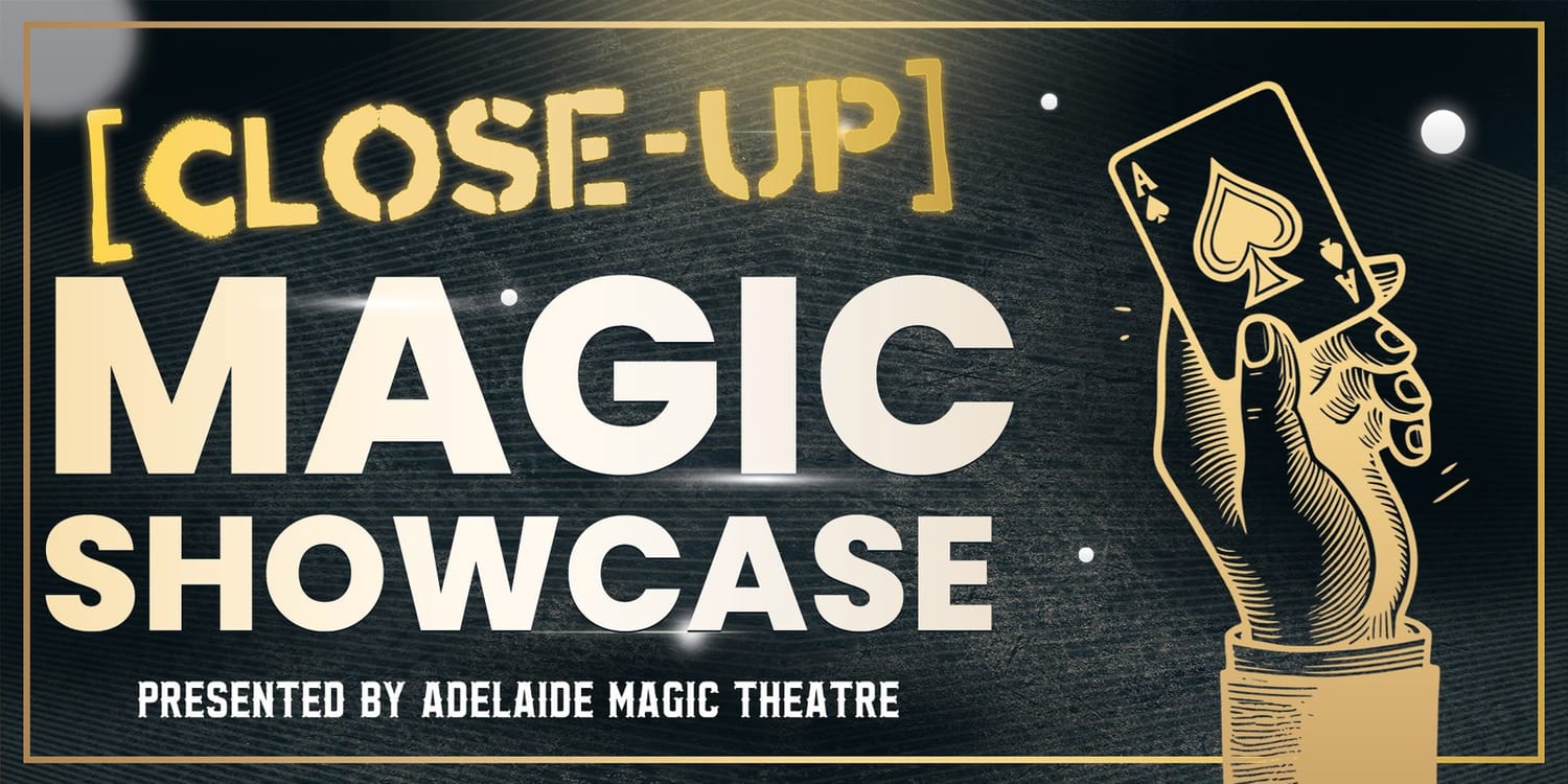 Close-up magic performed at a table for a small, captivated audience in the Adelaide CBD