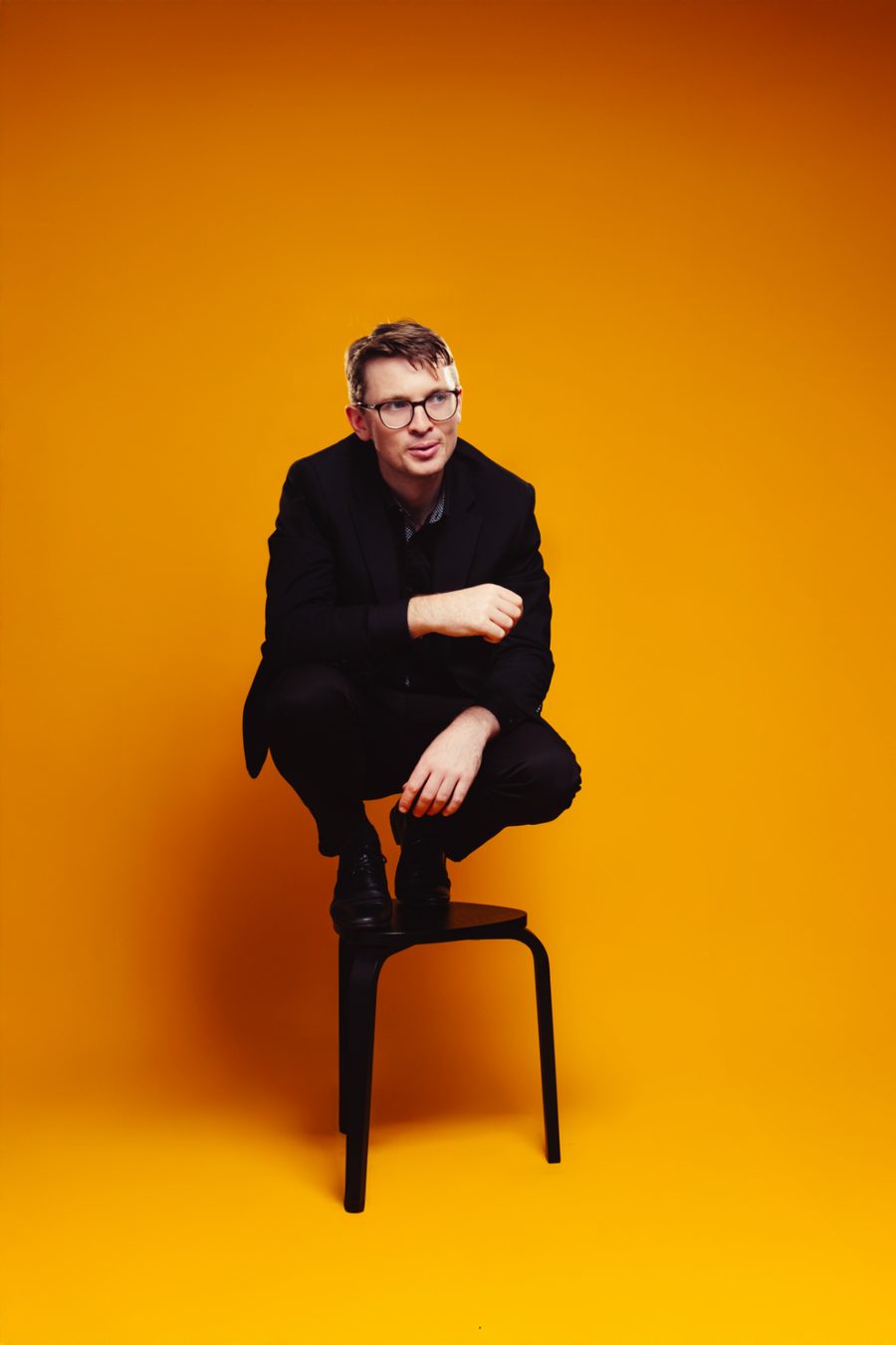Samuel King, award-winning comedy magician and co-founder of Adelaide Magic Theatre, smiling confidently